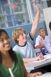 Students answering questions in geography class