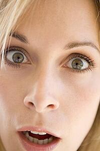 Head shot of surprised woman