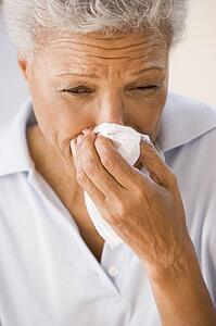 Woman Blowing Her Nose