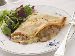 Savoury Pancake filled with Ham Cheese and Mushrooms with dressed salad