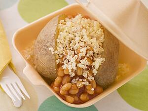 Baked Potato With Baked Beans And Cheese In A Take Away Box