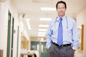 Doctor Standing In A Hospital Corridor