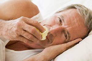 Man Blowing His Nose