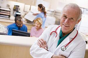 Doctors And Nurses At The Reception Area Of A Hospital