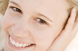 Head shot of woman smiling