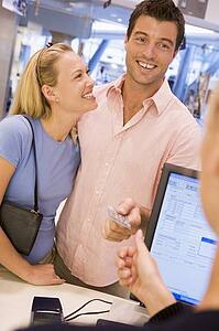 Man paying for purchases with credit card