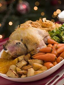 Pheasant Roasted with Orange Carrots Watercress and Parsnip Crisps