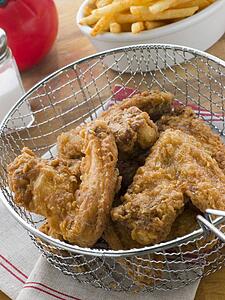 Southern Fried Chicken in a Basket with Fries