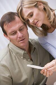 Couple with pregnancy test upset