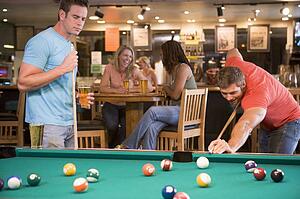 Two men playing pool