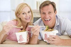 Couple Eating Takeaway meal, mealtime Together