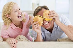 Couple Enjoying Burgers Together