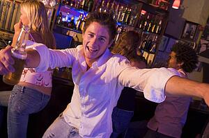 Young man in a bar