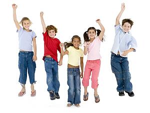 Five friends jumping and smiling