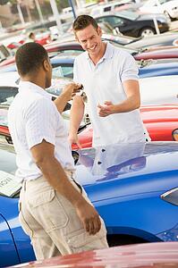 Man shopping for a new car