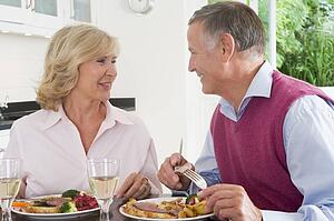 Elderly Couple Enjoying meal, mealtime Together