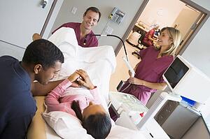 Doctor retrieving eggs from ovary using vaginal ultrasound