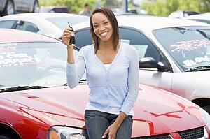 Woman shopping for a new car