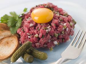 Steak Tartare with Cornichons, Croutons and an Egg Yolk