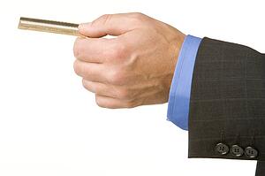 Businessman Holding A Gold Credit Card 