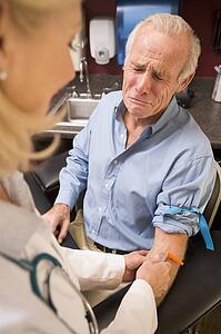 Middle Aged Man Having Blood Test Done