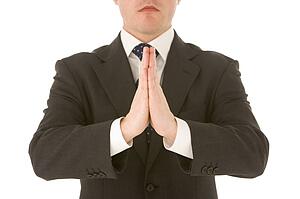 Businessman Holding With His Hands Together 