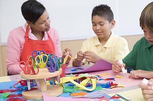 Teacher and students in art class (selective focus)