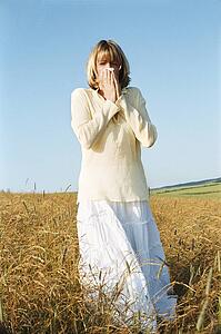 Woman Blowing Her Nose