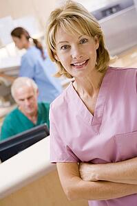 Nurses In The Reception Area Of A Hospital