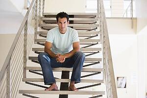 Man sitting on staircase