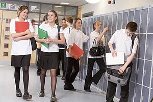 Secondary school students in a school hallway