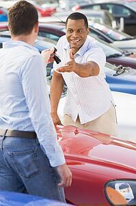 Man shopping for a new car