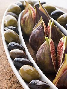 Dish of Green and Black Olives with Fresh Figs