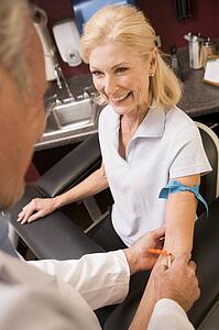 Middle Aged Woman Having Blood Test Done