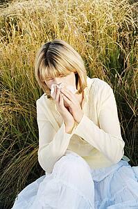Woman Blowing Her Nose