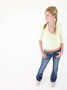 Teenage girl with hands on hips