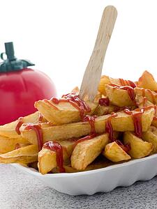 Portion Of Chips In A Polystyrene Tray With Tomato Ketchup