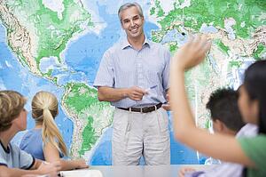 Students answering questions in geography class
