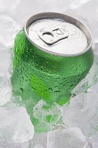 Green Can Of Fizzy Soft Drink Set In Ice 