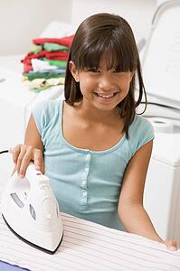 Young Girl Ironing 