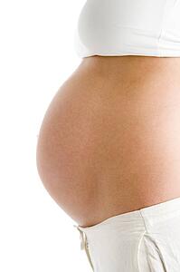 Pregnant woman's exposed belly