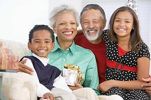 Children With Grandparents At Christmas