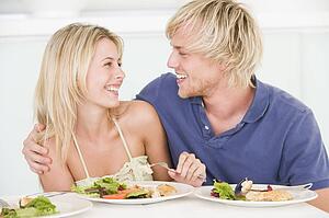 Young Couple Enjoying meal, mealtime Together