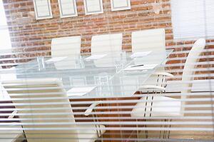 Empty boardroom through a window