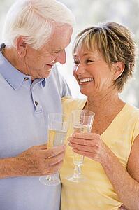 Couple drinking champagne and smiling