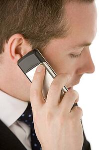 Businessman Talking On Mobile Phone 