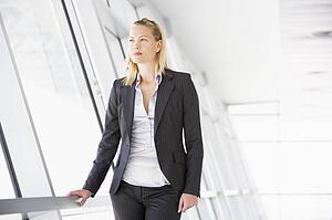 Businesswoman standing in corridor