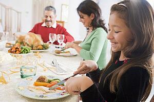 Family All Together At Christmas Dinner