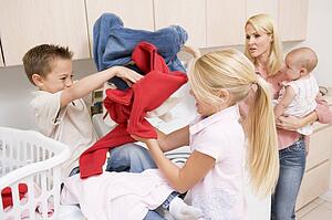 Siblings Fighting While Doing Laundry 
