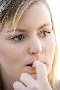 Head shot of worried woman